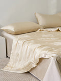 Phantom Gold Tencel™ Jacquard Light Comforter