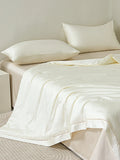 Lily White Tencel™ Jacquard Light Comforter